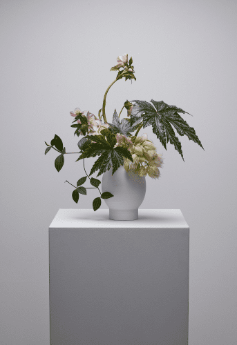 Green vase arrangement event flowers